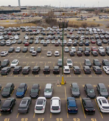 Recently manufactured vehicles are parked awaiting shipment near Ford’s Oakville Assembly Plant in Oakville, Ontario.