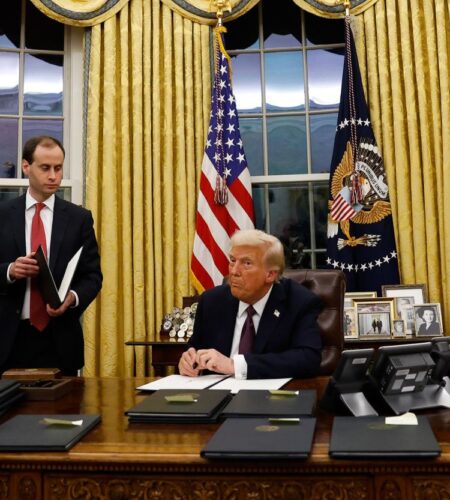 President Donald Trump signs executive orders in the Oval Office on January 20, 2025 in Washington, DC.