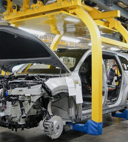 Employees work on a car assembly line at a factory of Chinese carmaker Li Auto in Changzhou, China, in March 2024.